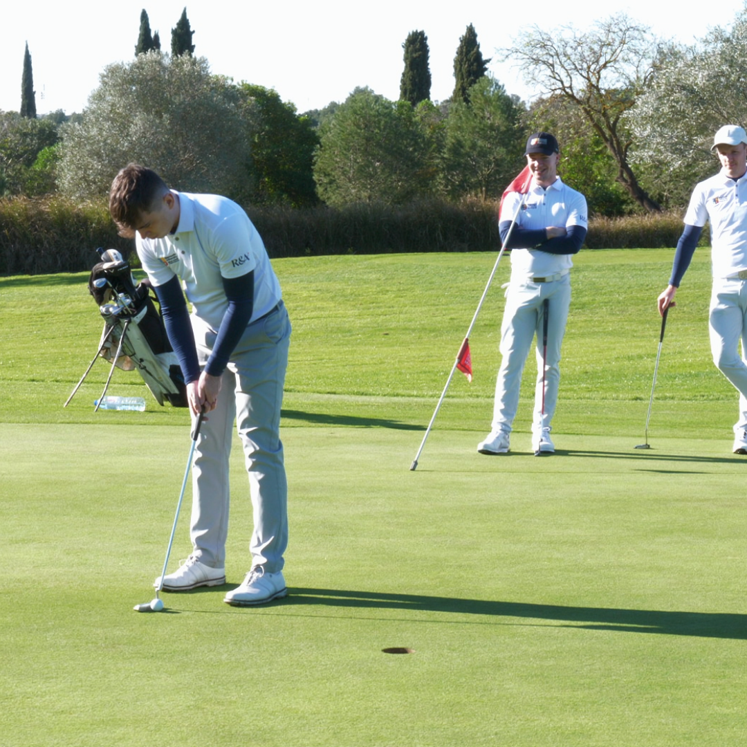 Group shot of golfers wearing compression wear while playing golf.
